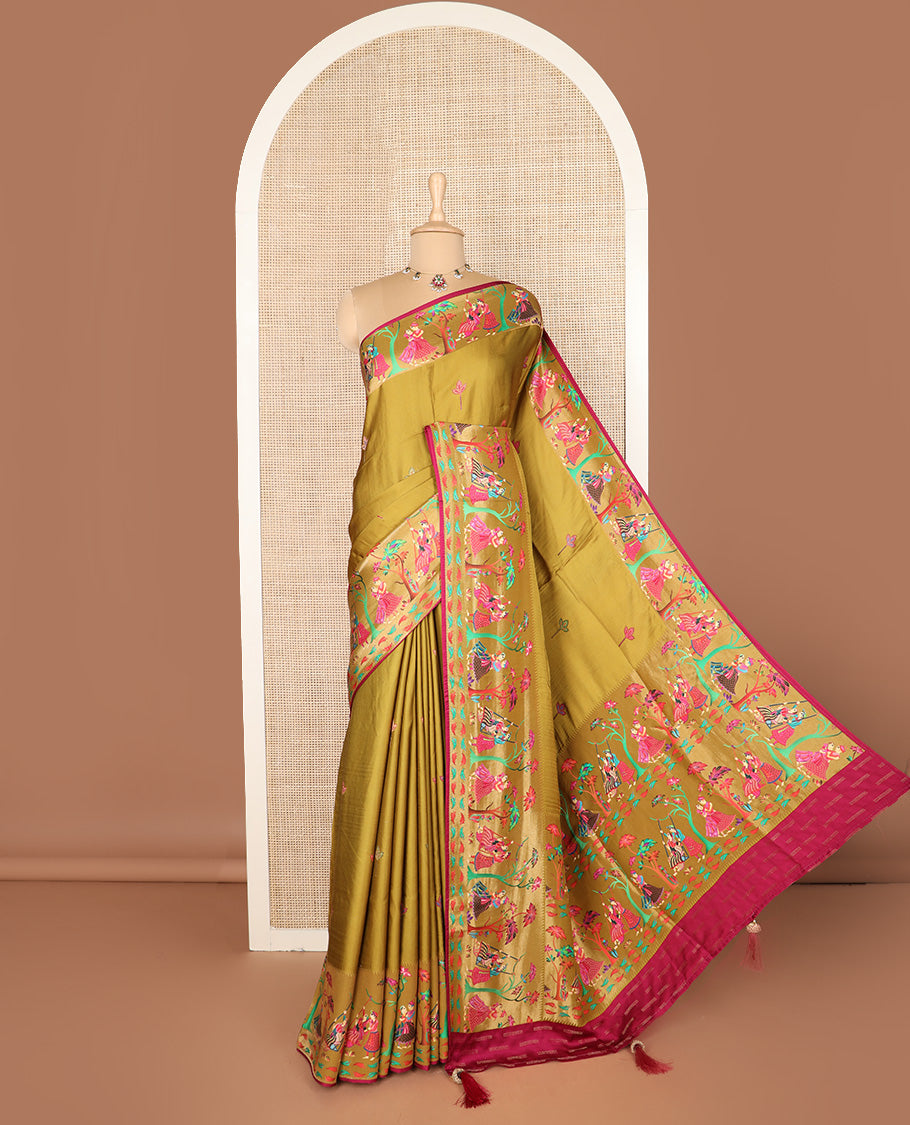 Green unique motifs printed dola silk saree, gleaming zari border, and pallu of Mughal-style man and women motifs