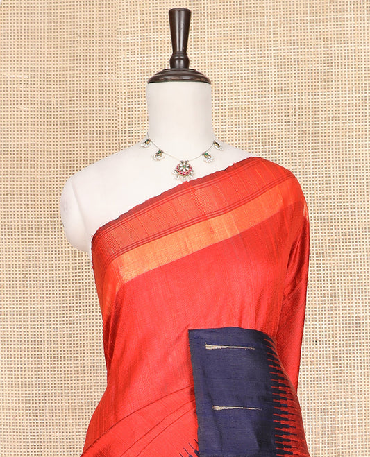 Orange Plain Dupion Silk Saree, Complemented by a One-Side Contrast Temple Border, Zari Elevated Pallu of Temple Designs, and Paired with a Contrast Blouse