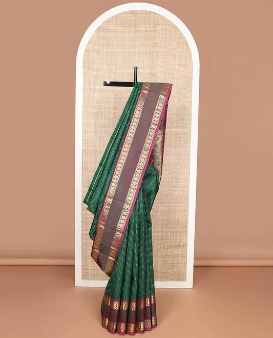 Green chevron kancheepuram silk saree with contrast border of rettai petti rekku, banaras, poo chakram design & zari design pallu