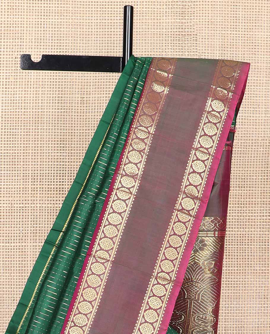Green chevron kancheepuram silk saree with contrast border of rettai petti rekku, banaras, poo chakram design & zari design pallu