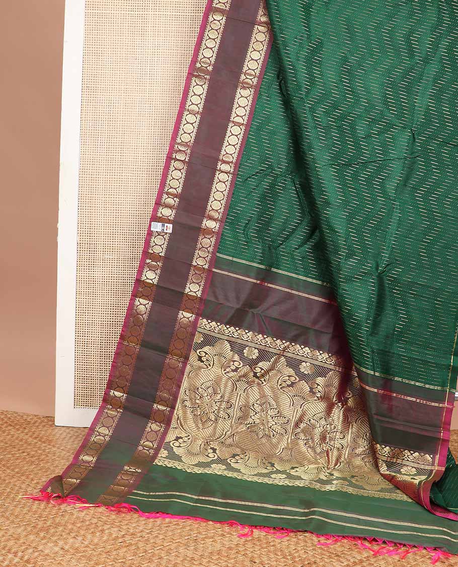 Green chevron kancheepuram silk saree with contrast border of rettai petti rekku, banaras, poo chakram design & zari design pallu