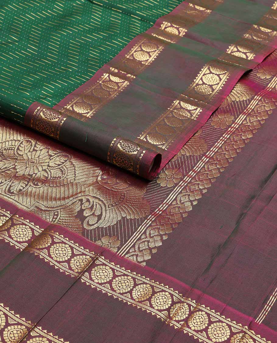 Green chevron kancheepuram silk saree with contrast border of rettai petti rekku, banaras, poo chakram design & zari design pallu