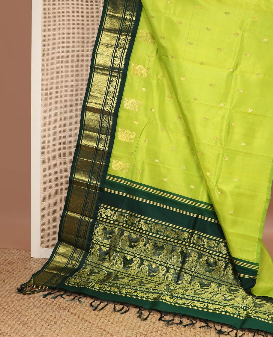 Green zari buttas kanchipuram silk saree, contrast one-sided korvai border of salngai, kodi visiry & jaal & anicient human motifs woven pallu