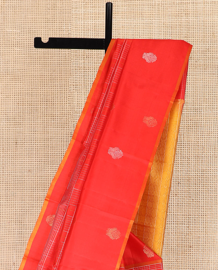 Red Kanchipuram Silk Saree, Scintillated with Zari Checks All Over Its Body, Highlighted by Self-Border of Iruthalai Pakshi Designs, Complemented by Contrast Striped Pallu, and Paired with a Contrast Blouse