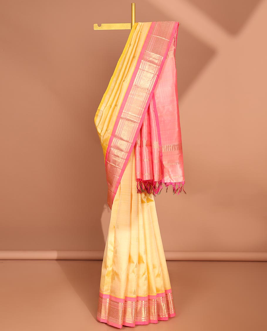 Yellow floral buttas kancheepuram silk saree with contrast border of sombu,banaras, muthu, jaal design & zari design pallu