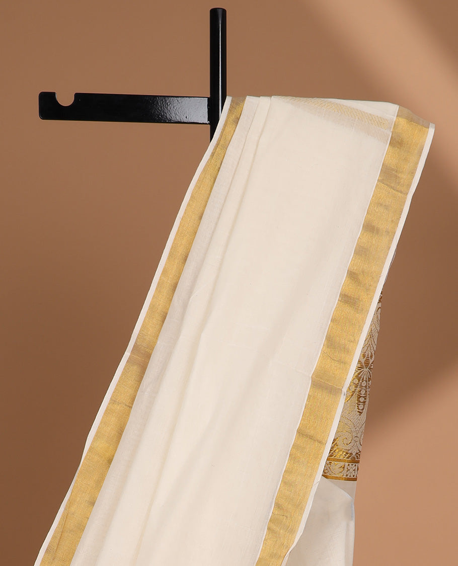 Cream kerala saree with zari design, plain border & pallu of intricate designs