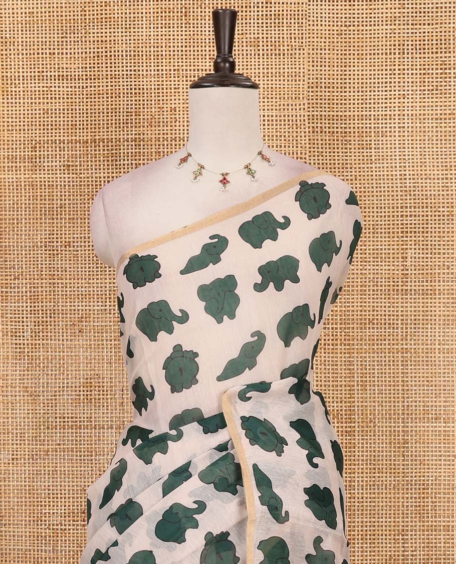 Borderless cream-green elephant motifs printed linen cotton saree, matching elephant motifs printed blouse