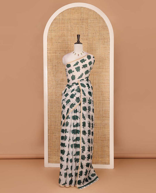 Borderless cream-green elephant motifs printed linen cotton saree, matching elephant motifs printed blouse