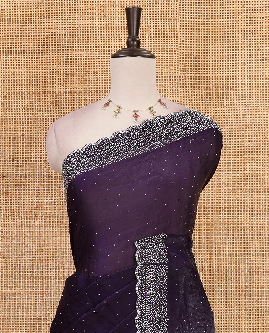 Violet Swarovski crystal stone embedded fendy chiffon saree, scallop Swarovski stone embroidered border, and contrast plain blouse
