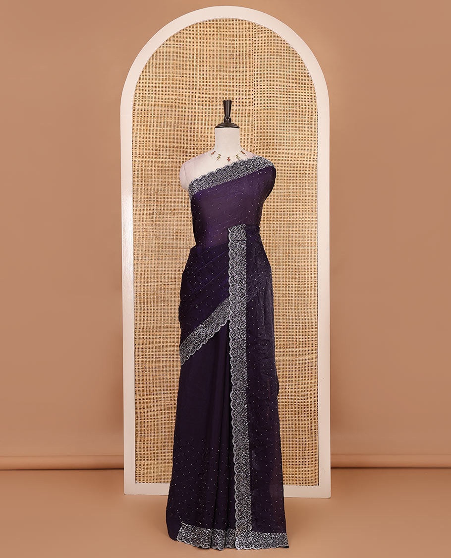 Violet Swarovski crystal stone embedded fendy chiffon saree, scallop Swarovski stone embroidered border, and contrast plain blouse