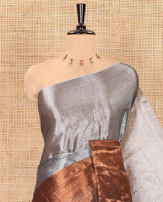 Silver and brown half-and-half plain khadi tissue saree with a self-pallu and a matching blouse