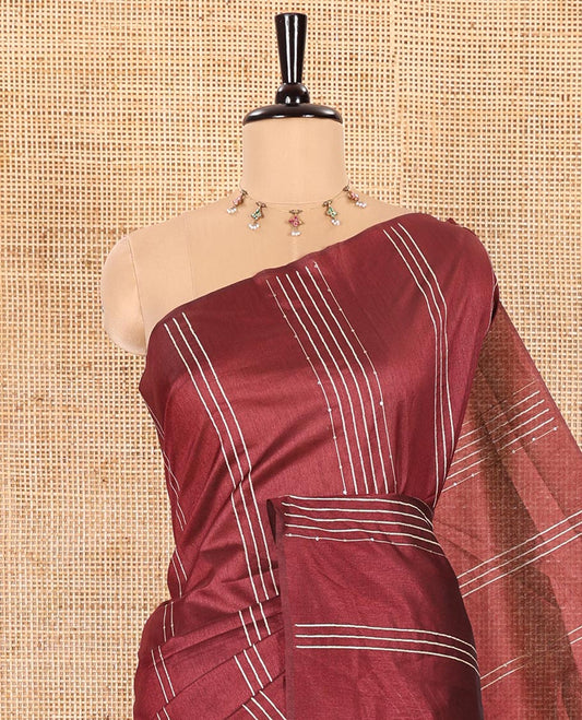 Borderless Maroon Semi-Raw Silk Saree Featuring Elegant Vertical Sequin Stripes Running Across the Body, Complemented by a Contrast Thread-Work Pallu and Paired with a Contrast Blouse