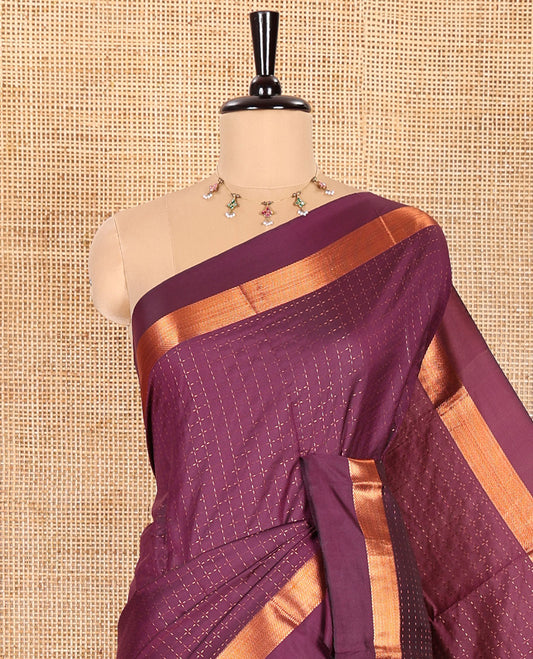 Purple Semi-Soft Silk Saree Enthralled  with Plus-Shaped Buttas All Over the Body, Highlighted with Zari Border, Complemented by Contrast Pallu of Zari Stripes, and Paired with a Contrast Blouse