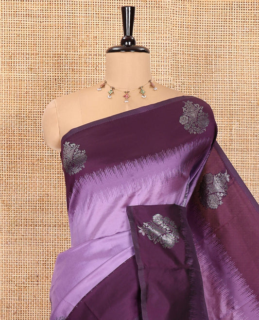 Lavender Kanchi Silk Saree, Adorned with Zari Buttas All Over Its Body, Complemented by a Contrast Border of Unique Buttas, Pallu Grandly Woven with Intricate Designs, and Paired with a Contrast Blouse