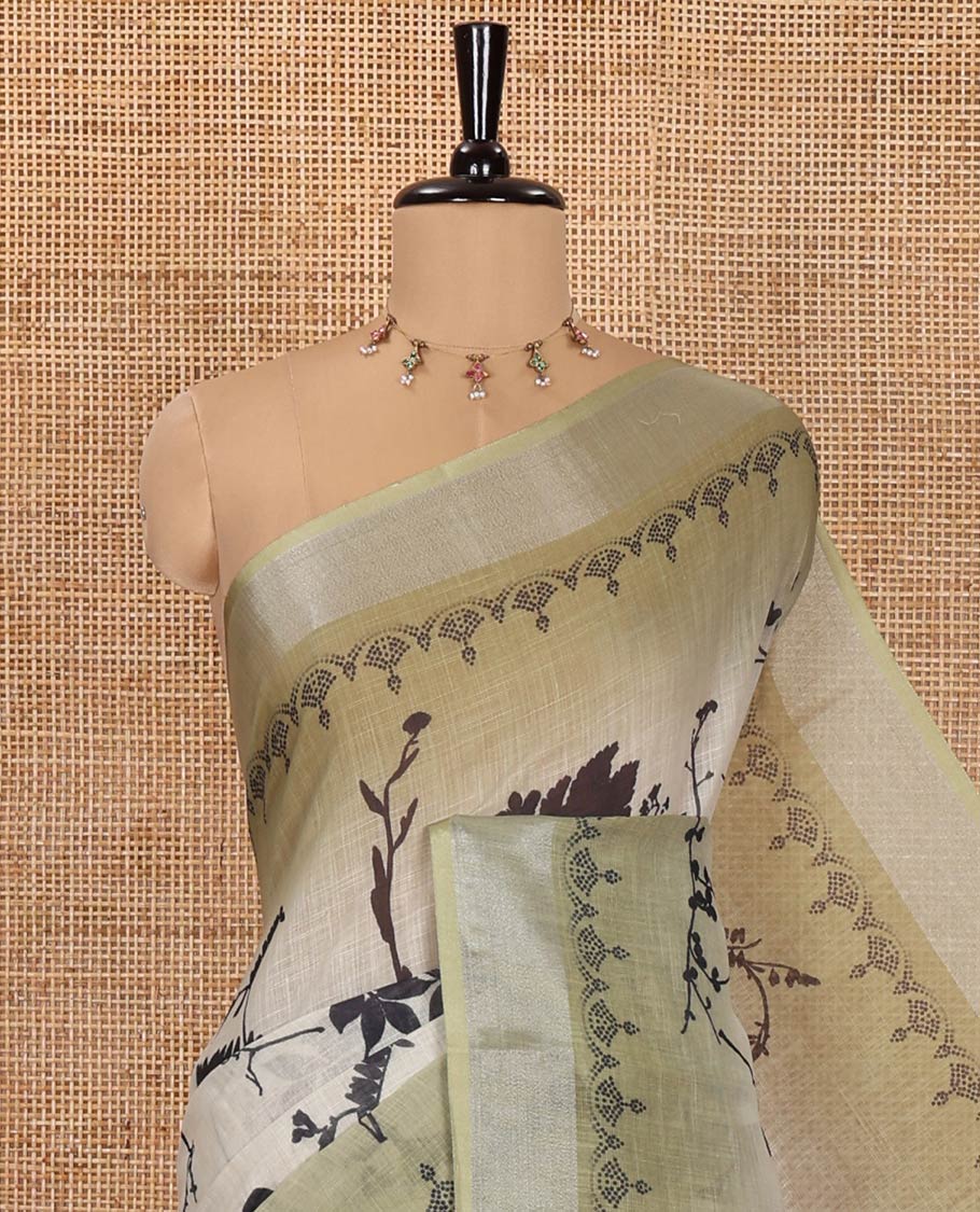 Green Linen Cotton Saree, Embellished with Silhouette-Style Floral Motifs Printed on Its Body, Subtle Zari Bavanji Border, Pallu of Silhouette-Style Floral Print, and Comes with a Matching Blouse