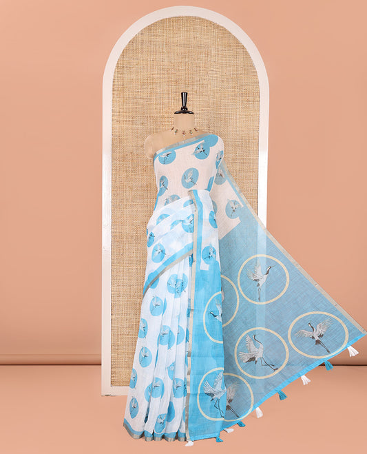 White-Blue Linen Cotton Saree, Steeped with Polka Dot Enclosed Crane Motifs on Its Body, Subtle Piping Border, Pallu Pictures Polka Dot Enclosed Crane Motifs, and Paired with a Matching Blouse