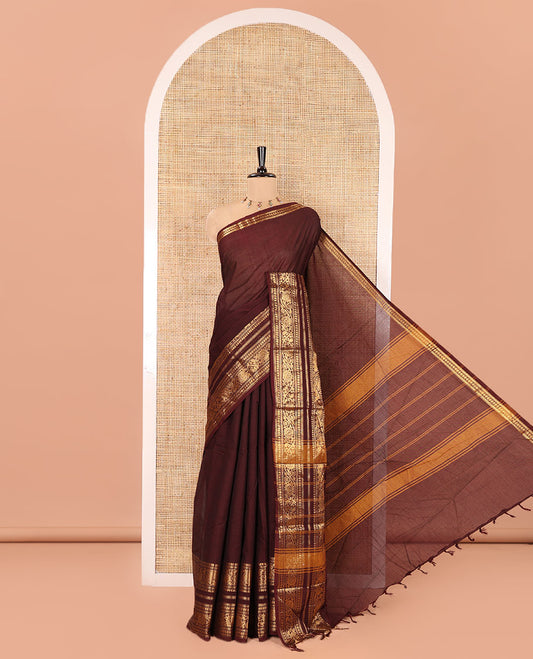 Maroon Plain Chettinad Cotton Saree, Highlighted by Self-Border of Traditional Zari Designs, Subtly Striped Pallu, and Paired with a Matching Blouse