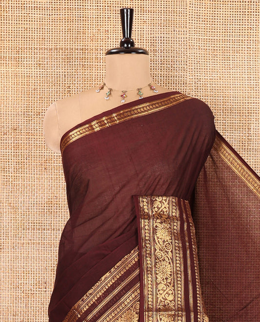 Maroon Plain Chettinad Cotton Saree, Highlighted by Self-Border of Traditional Zari Designs, Subtly Striped Pallu, and Paired with a Matching Blouse