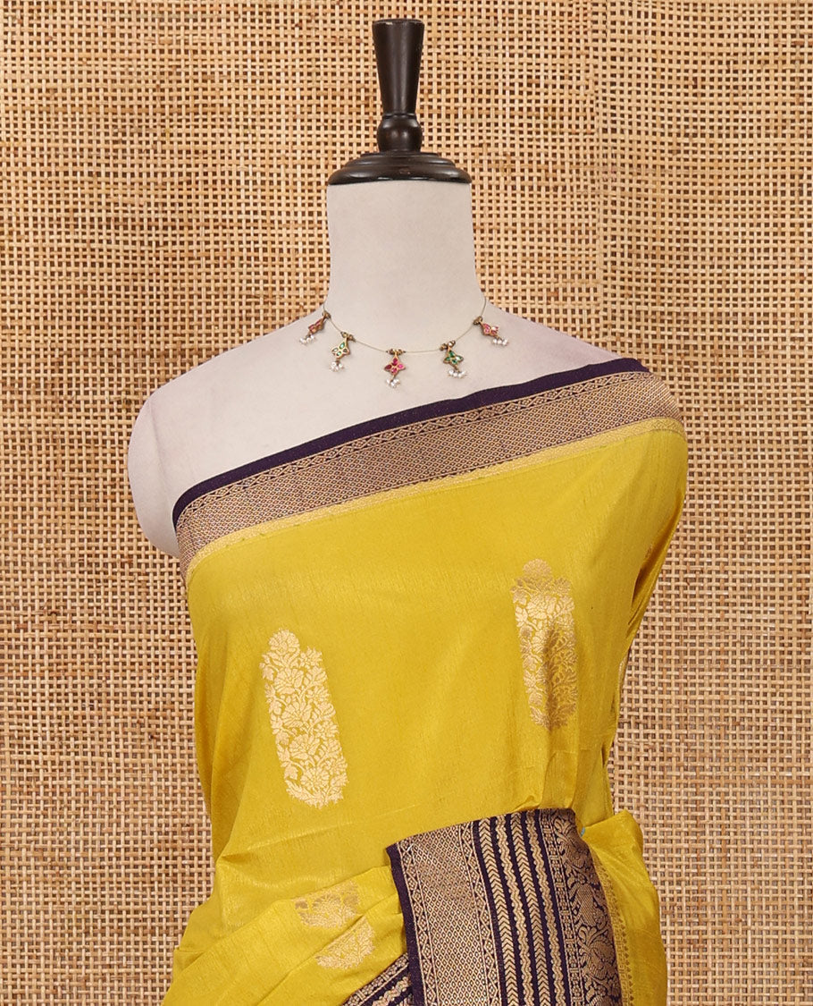 Mustard floral zari buttas dola silk saree, contrast traditional zari peacock border, diagonal floral zari striped pallu & contrast jacquard blouse