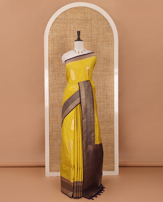 Mustard floral zari buttas dola silk saree, contrast traditional zari peacock border, diagonal floral zari striped pallu & contrast jacquard blouse
