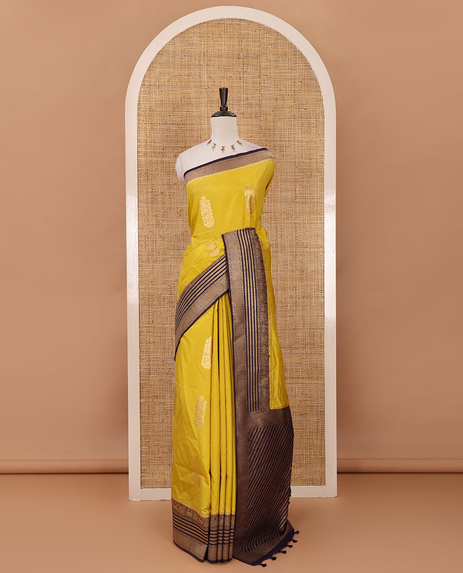 Mustard floral zari buttas dola silk saree, contrast traditional zari peacock border, diagonal floral zari striped pallu & contrast jacquard blouse