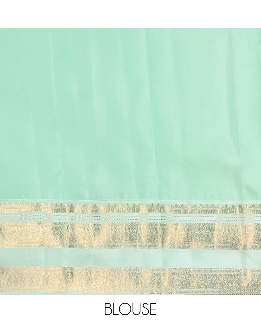 Blue zari buttas Vasundhara silk mix saree, contrast rettai pettu border of thilakam, muthu, neli, and mayil designs, and intricate pallu