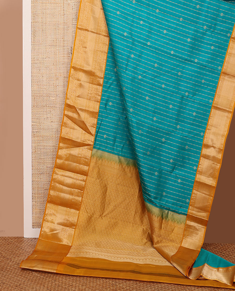Blue zari buttas silk saree, contrast scallop design pallu & border of thilakam mokku,banaras,muthu,lavangam & kodi visiry