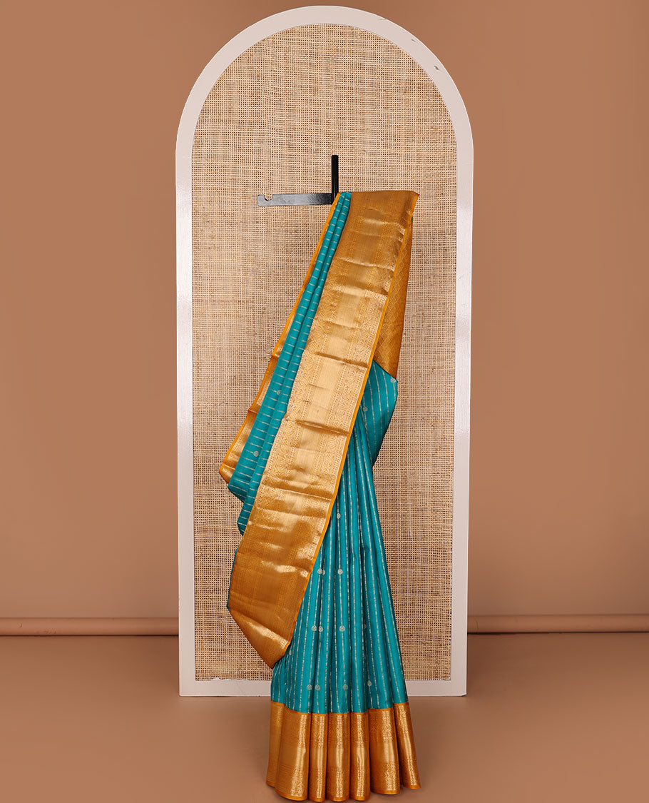 Blue zari buttas silk saree, contrast scallop design pallu & border of thilakam mokku,banaras,muthu,lavangam & kodi visiry