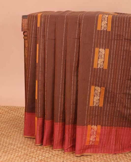 Borderless brown buttas and dotted striped Coimbatore cotton saree, contrast border, and pallu of tree motifs