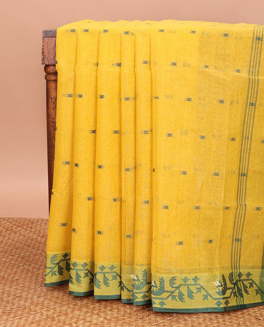 Yellow Bengal Cotton Saree, Woven with Buttas on Its Body, Highlighted by a Jamdani-Style Floral Creeper Border, and Pallu Steeped with Buttas
