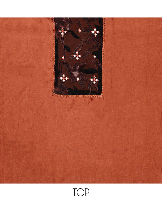 Orange material chudidar set, patch embroidered top, plain bottom, and contrast floral printed dupatta