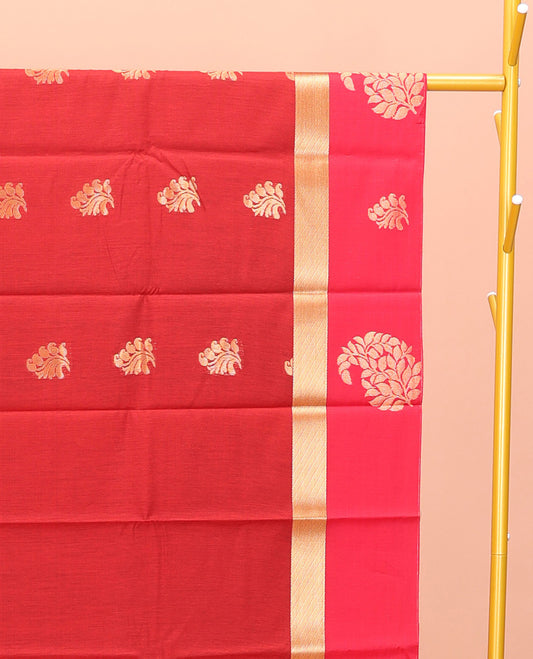 Red Semi-Silk Cotton Saree, Richly Detailed with Zari Buttas All Over Its Body, Complemented by a Contrast Paisley Zari Design Border, Pallu of Floral Design, and Paired with a Contrast Blouse