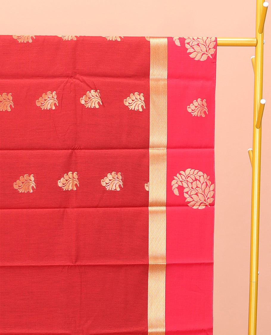Red Semi-Silk Cotton Saree, Richly Detailed with Zari Buttas All Over Its Body, Complemented by a Contrast Paisley Zari Design Border, Pallu of Floral Design, and Paired with a Contrast Blouse