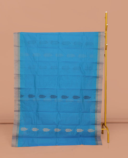 Blue Kanchi Cotton Saree, Accentuated with Buttas All Over Its Body, Complemented by a Contrast Border, Pallu of Floral and Paisley Designs, and Paired with a Matching Blouse