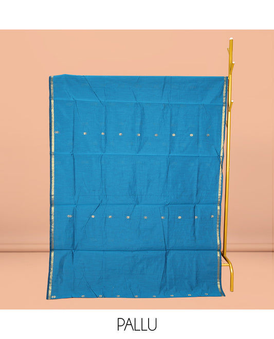 Blue Maheshwari Cotton Saree, Delicately Woven with Buttas All Over Its Body, Subtle Zari Piping Border, Complemented by a Contrast Pallu Steeped with Buttas, and Paired with a Contrast Blouse