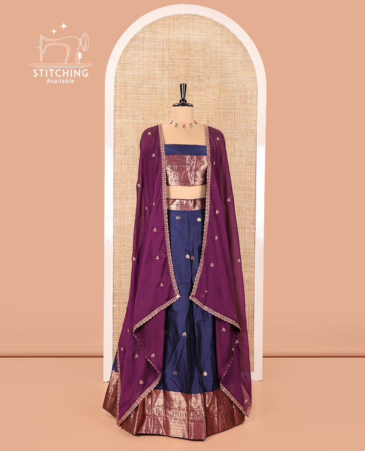 Dark Blue and Purple Semi-Banarasi Half-Saree, Prettified with Zari Buttas on Its Skirt, Complemented by a Contrast Traditional Zari Design Woven Border, Paired with a Matching Blouse, and a Contrast Satin Georgette Embroidered Scallop Dhavani