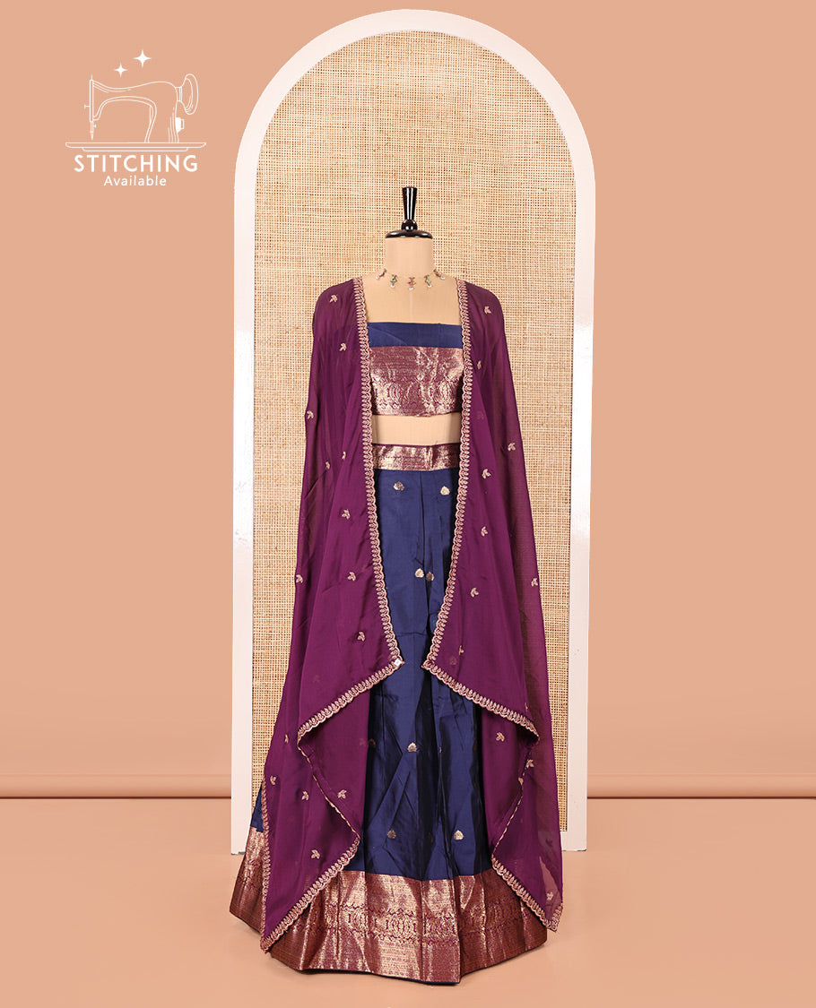 Dark Blue and Purple Semi-Banarasi Half-Saree, Prettified with Zari Buttas on Its Skirt, Complemented by a Contrast Traditional Zari Design Woven Border, Paired with a Matching Blouse, and a Contrast Satin Georgette Embroidered Scallop Dhavani