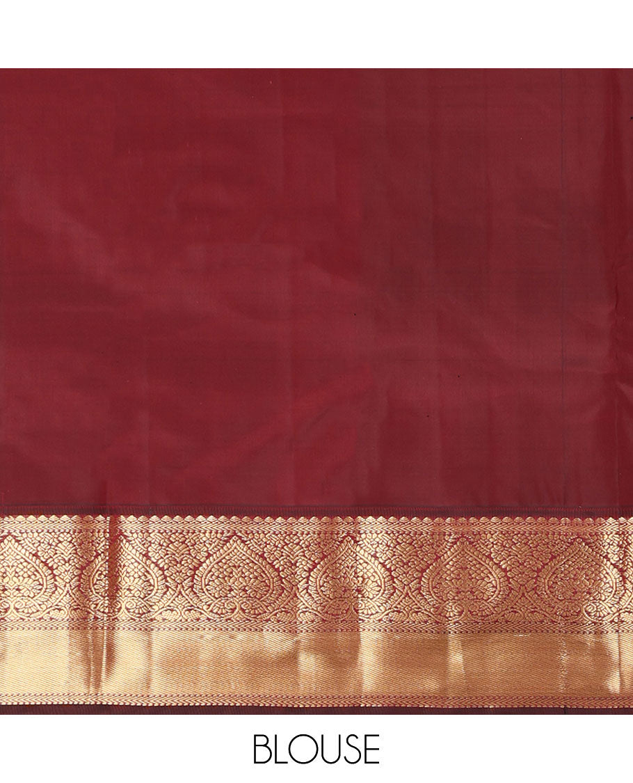 Orange Vasundhara Silk Saree, Adorned with Zari Buttas on Its Body, Complemented by a Contrast Border of Thilakam, Muthu, Kathir, and Jaga Nagam Designs, Grand Jaal Pallu, and Paired with a Contrast Blouse