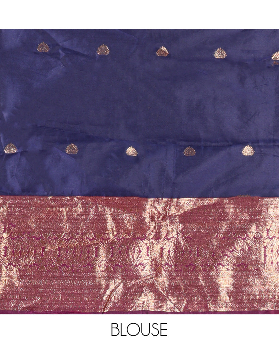 Dark Blue and Purple Semi-Banarasi Half-Saree, Prettified with Zari Buttas on Its Skirt, Complemented by a Contrast Traditional Zari Design Woven Border, Paired with a Matching Blouse, and a Contrast Satin Georgette Embroidered Scallop Dhavani