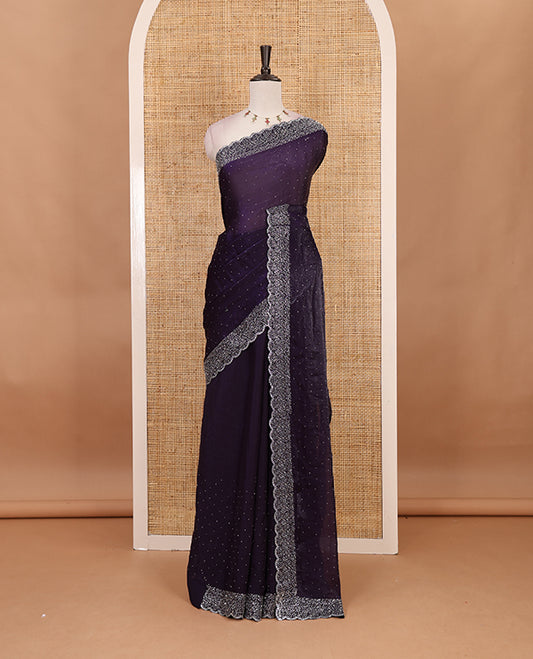 Violet Swarovski crystal stone embedded fendy chiffon saree, scallop Swarovski stone embroidered border, and contrast plain blouse