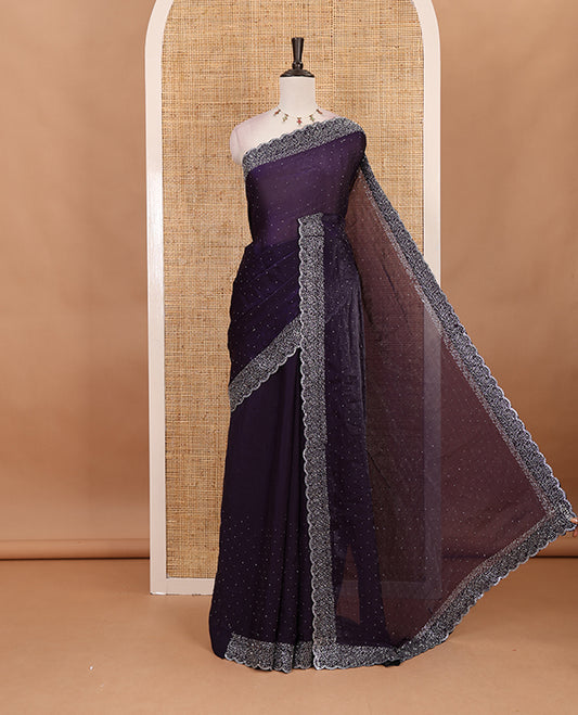 Violet Swarovski crystal stone embedded fendy chiffon saree, scallop Swarovski stone embroidered border, and contrast plain blouse