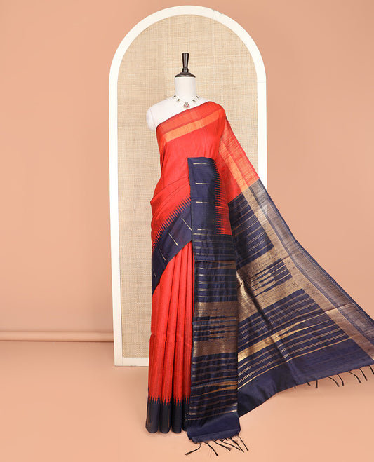 Orange Plain Dupion Silk Saree, Complemented by a One-Side Contrast Temple Border, Zari Elevated Pallu of Temple Designs, and Paired with a Contrast Blouse
