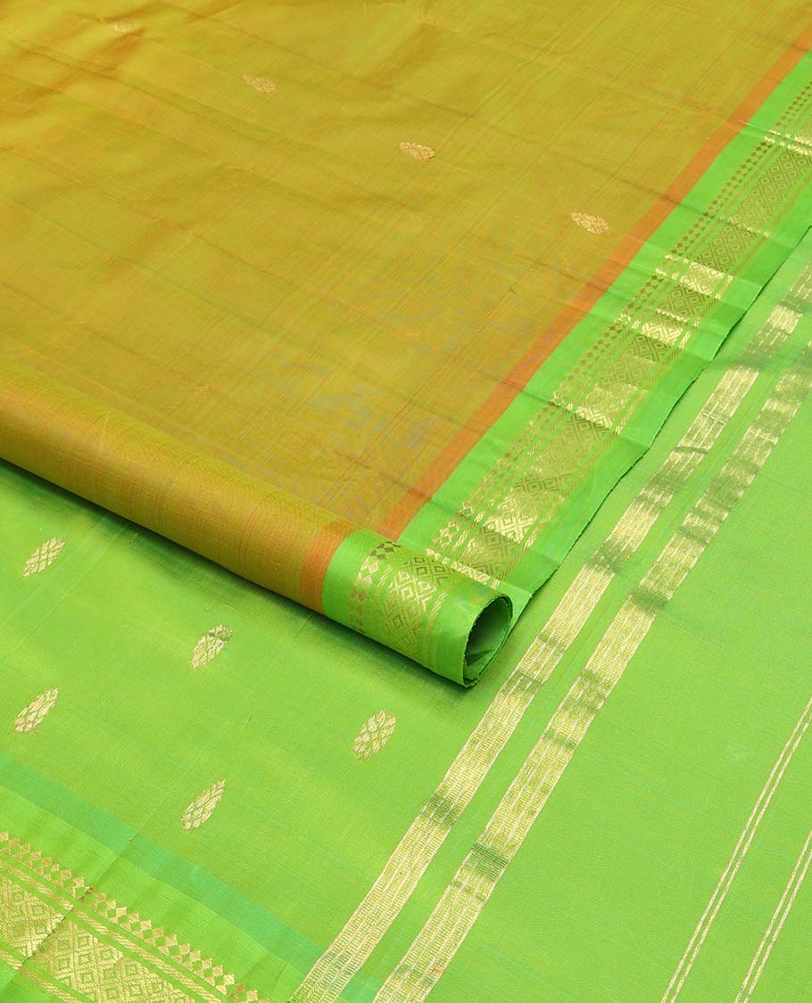 Green buttas kancheepuram silk saree with contrast border of zari design & striped, floral design pallu