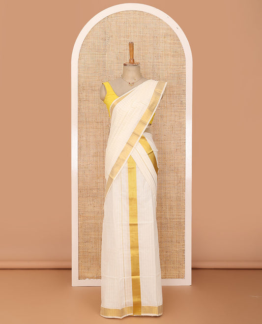 Cream golden vertically striped Kerala Mundu set, zari bavanji border