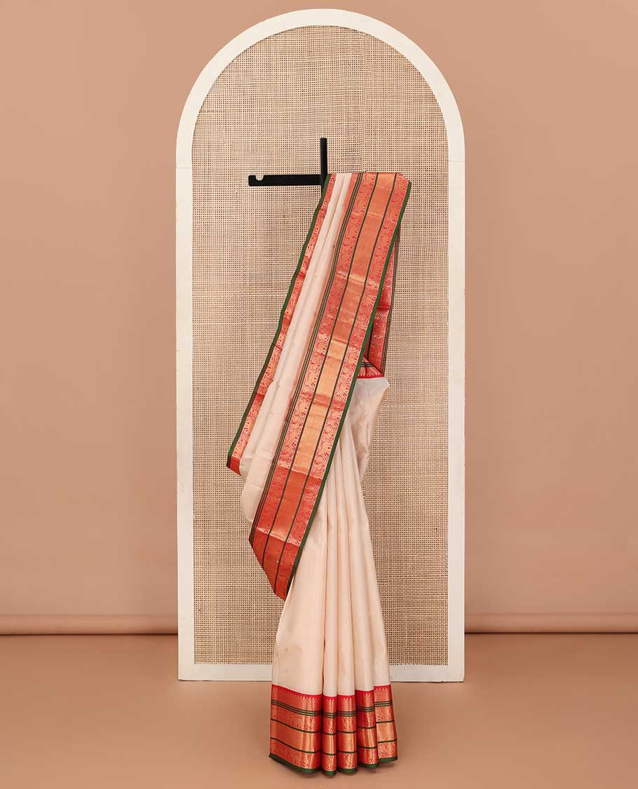 Sandal annam chakram zari buttas silk saree, contrast border of thilakam mokku, Muthu, jaal, kodi yaanai and mayil and jaal pallu