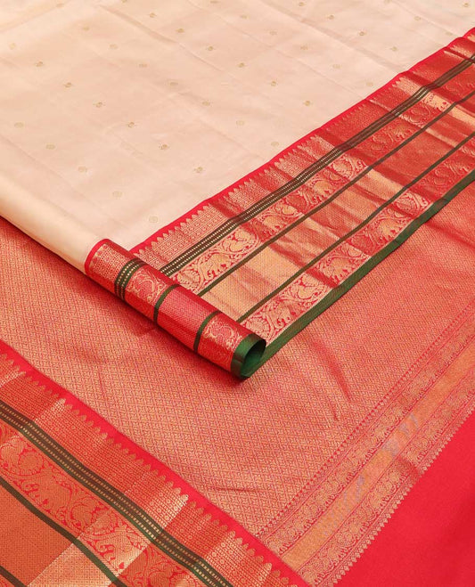 Sandal annam chakram zari buttas silk saree, contrast border of thilakam mokku, Muthu, jaal, kodi yaanai and mayil and jaal pallu