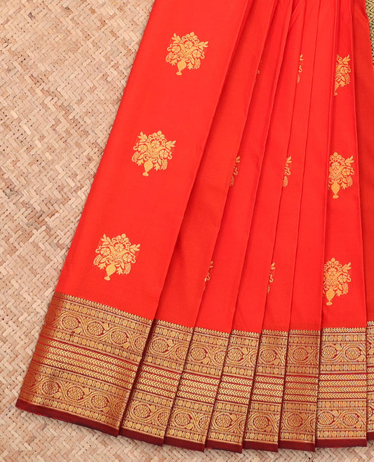 Orange Budget Silk Saree, Elevated with Zari Buttas All Over Its Body, Complemented by a Contrast Traditional Zari Design Border, Grand Jaal Pallu, and Paired with a Contrast Blouse