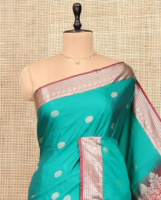 Green Budget Silk Saree, Beautified with Zari Buttas, Complemented by Contrast Traditional Zari Border, Pallu of Floral Design, and Contrast Blouse