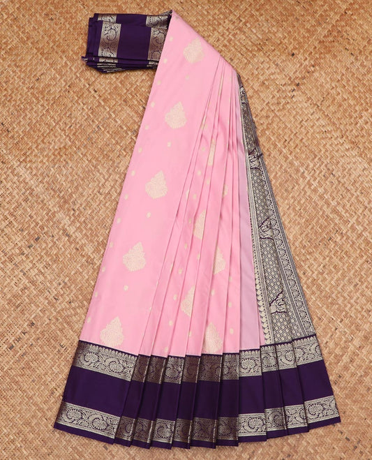 Pink zari buttas gift saree, contrast traditional zari rettai pettu border, and pallu of jaal and paisleys
