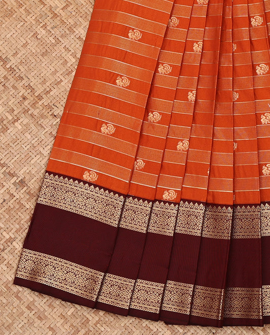 Orange Budget Silk Saree, Bedecked with Peacock Buttas and Zari Stripes All Over Its Body, Complemented by a Contrast Traditional Zari Design Rettai Pettu Border, Pallu of Jaal Design, and Paired with a Contrast Blouse